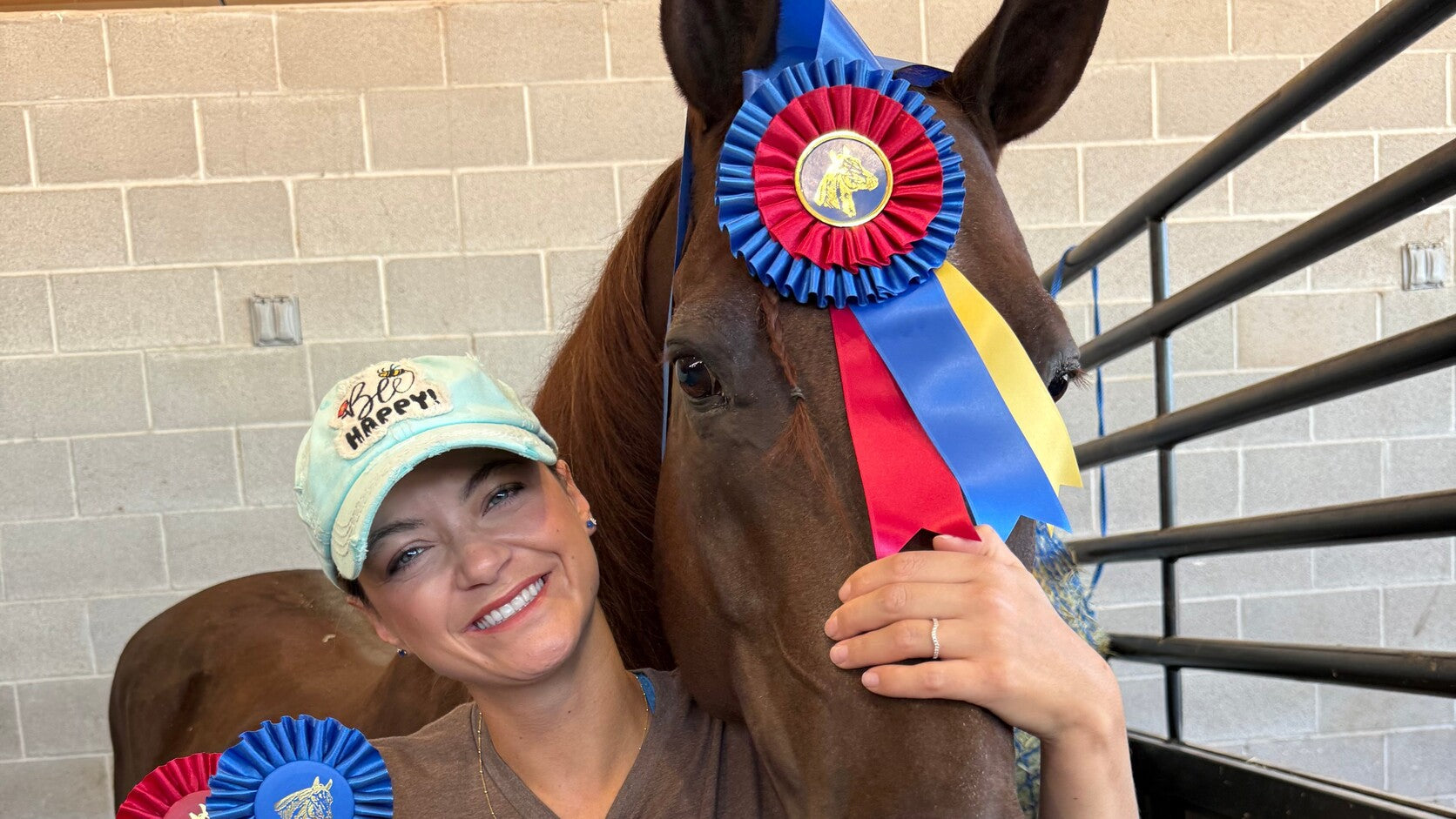 Anna Ryen Rowe with her Morgan horse and award ribbons