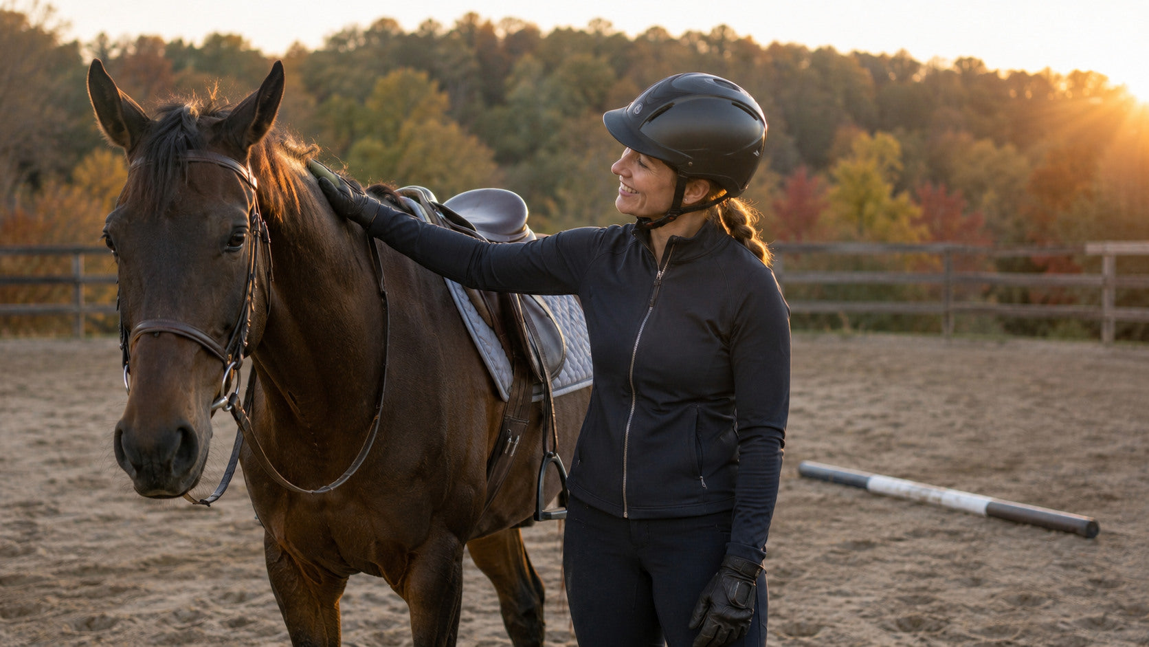 Rider sharing a quiet moment with her horse after a schooling ride