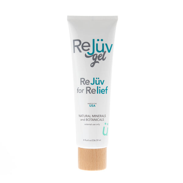 Tube of ReJuv gel with a wooden applicator on a white background