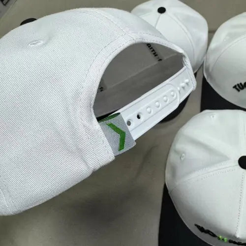 Posty snapback adjustable white snap closure and green arrow tag