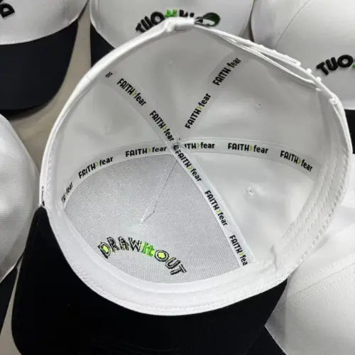 Inside the Posty snapback showing Faith > Fear printed taping